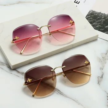 Uued päikeseprillid euramerican fashion prillid korrastamist frameless päikeseprillid metallist UV400 ms päikese prillid